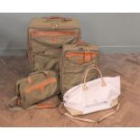 A collection of Hartmann luggage including large suitcase,