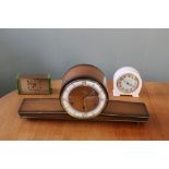 A collection of vintage and retro style clocks including Smiths and Essa