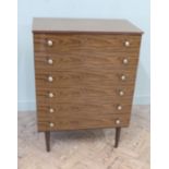 A 1960's Schreiber chest of six long drawers on tapered legs