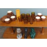 A mixed lot of 1970's ceramics and glasses, a concrete owl, cast iron gnome and a tribal head,