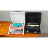 Two vintage portable typewriters