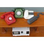 A red telephone, a green telephone,