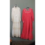A 1970's high neck full length wedding dress and a 1970's pink and white bridesmaid's dress