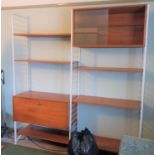 White metal and teak Ladderax style shelving unit with glass door cabinet and fall front cabinet