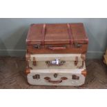 A vintage leather suitcase,