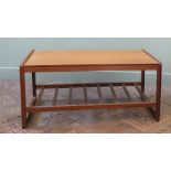 An Englender rectangular teak style coffee table with slatted under magazine tier