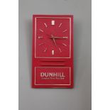 A Dunhill promotional wall clock (as found)