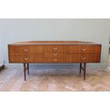 A 1970's sideboard with seven drawers