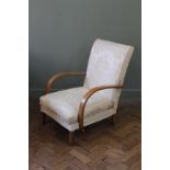 A 1930's cream armchair