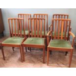 Six teak Danish style dining chairs with green velour seats including two carvers