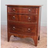 A late 19th Century converted bow front commode chest