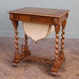 A mid Victorian oak and burr walnut veneer barley twist work table with fitted interior