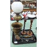 A pair of wooden hand carved barley twist candlesticks,