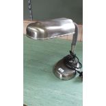 A late 20th Century brushed steel desk lamp