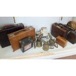 Four bygone leather cases,