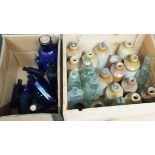 Two boxes of various bottles including blue glass examples