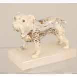 A slip ware bulldog on base,