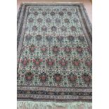 A Persian multicoloured ground rug,