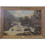 An oil on canvas depicting a rocky river scene in heavy gilt frame,