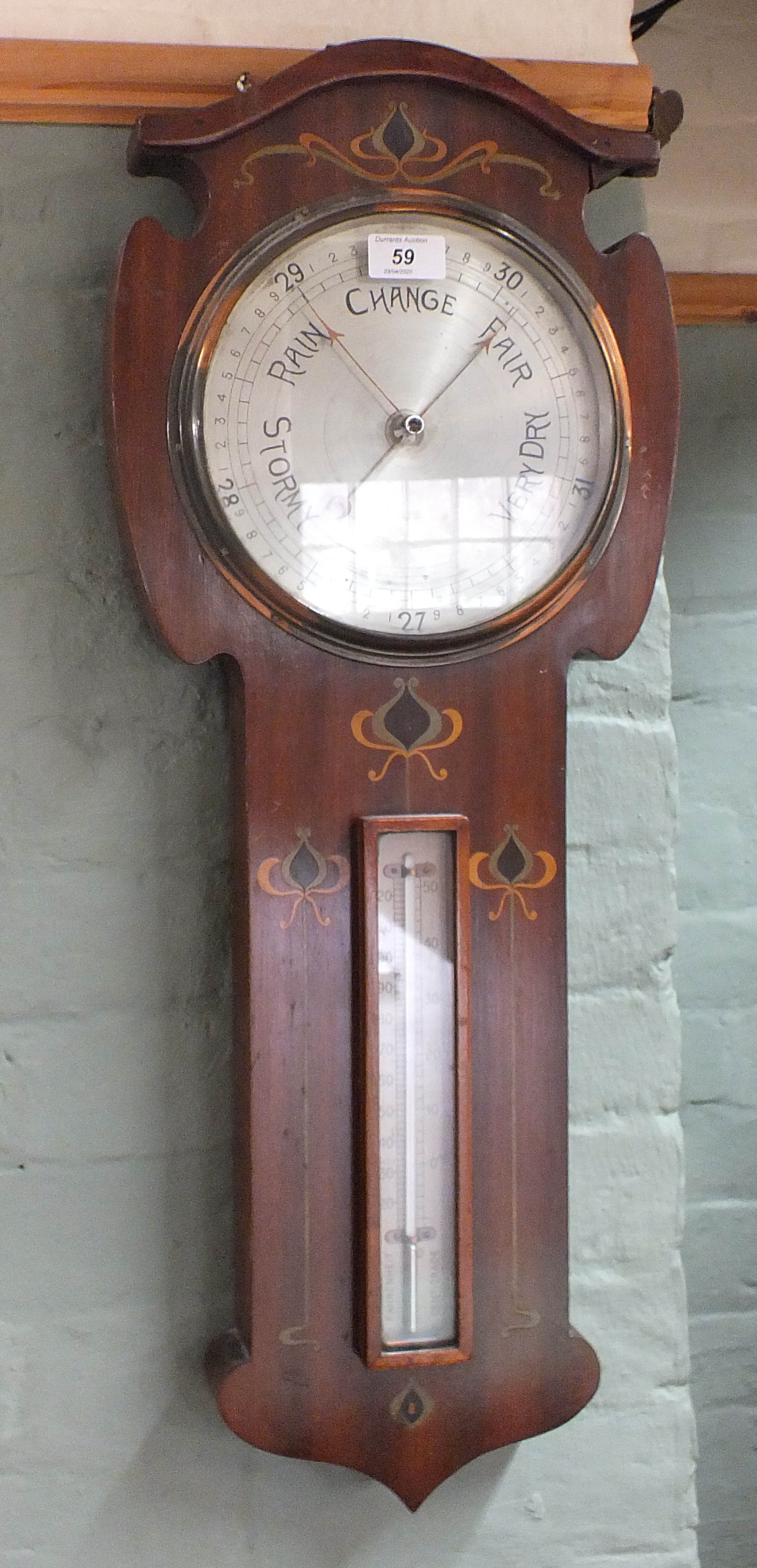 An inlaid barometer/thermometer