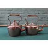 Two Victorian seamed copper kettles, one circular with hinged lid and the other oval,