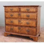 A George I walnut veneer chest of five drawers of very good original colour,