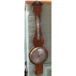 An inlaid banjo style barometer/thermometer