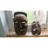 An African tribal mask and one other