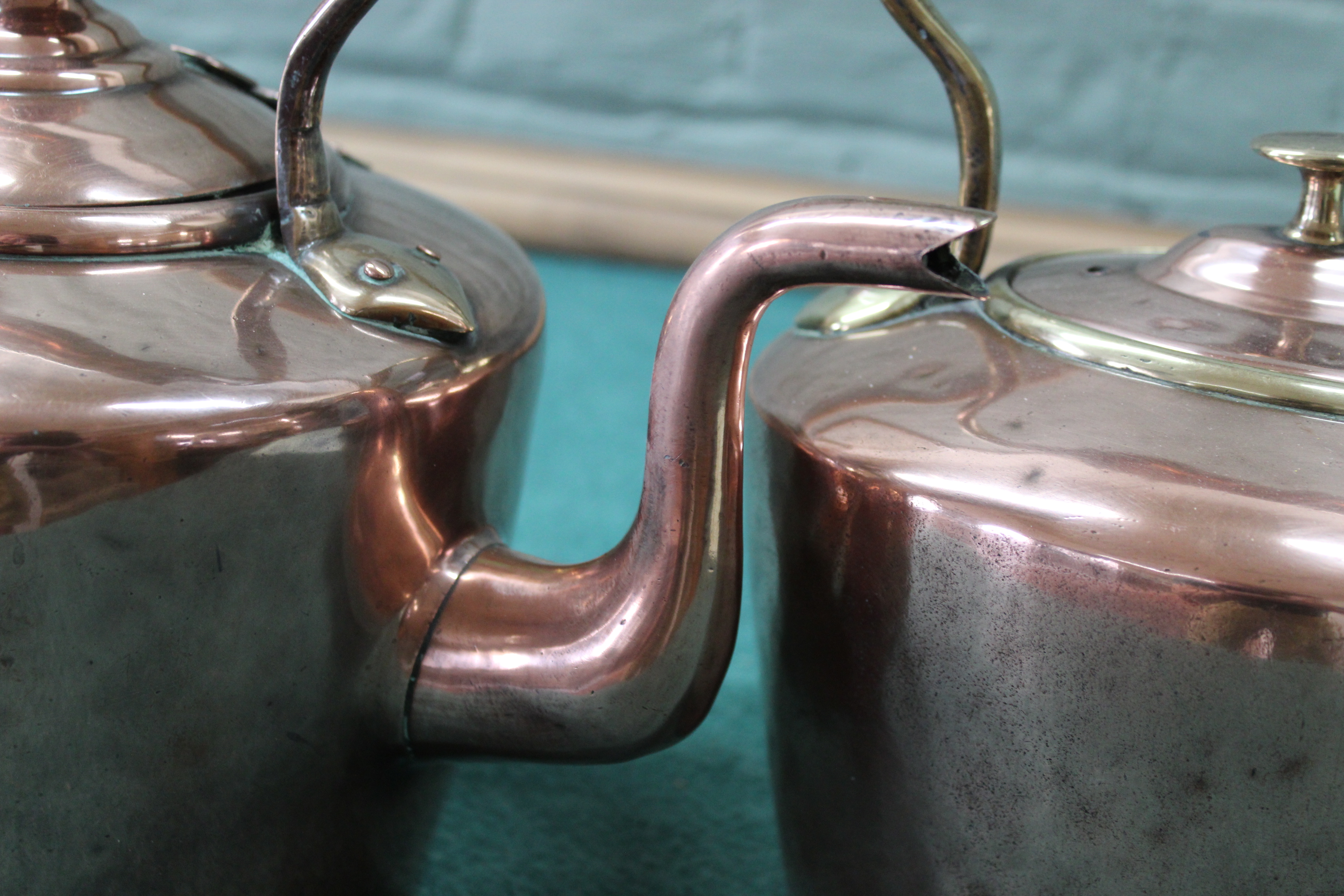 Two Victorian seamed copper kettles, one circular with hinged lid and the other oval, - Image 3 of 3