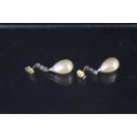 A pair of large pearl and diamond drop earrings,