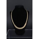 A 9ct gold graduating 'weave' style necklace,