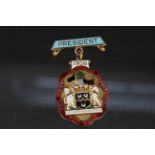 A 9ct gold enamel decorated Masonic President badge,