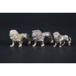 Three silver lion figures, various hallmarks,