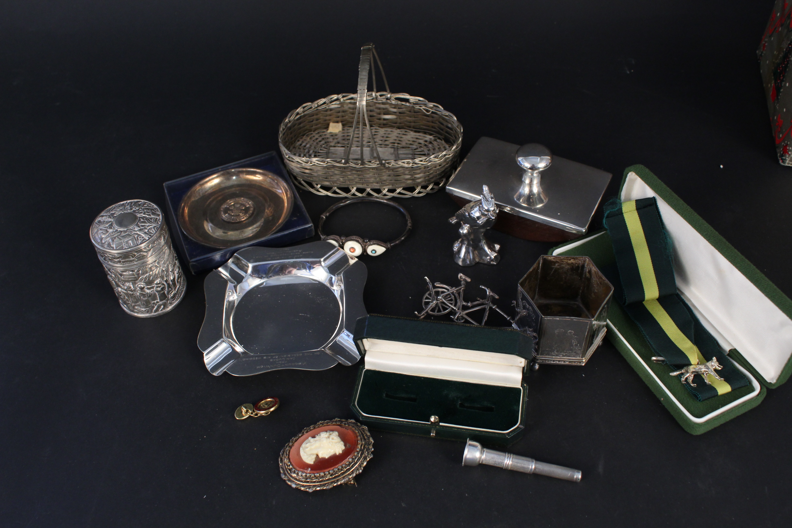 A mixed lot of silver and silver plate including silver mounted blotter, silver model of a bicycle,