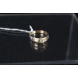 A yellow metal diamond set ring,