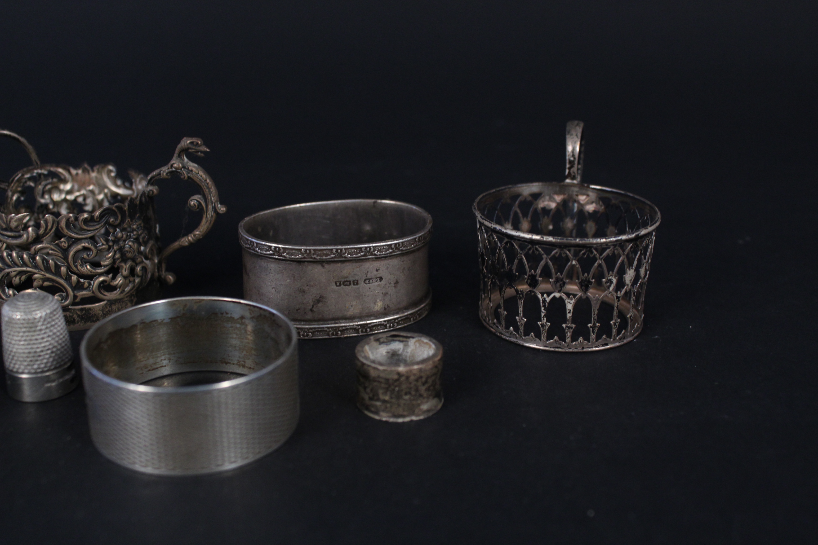 Three silver napkin rings, four silver cup holders (no glass) plus two silver thimbles, - Image 3 of 3