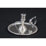 A miniature silver chamberstick with beaded edge detail, hallmarked London 1899,