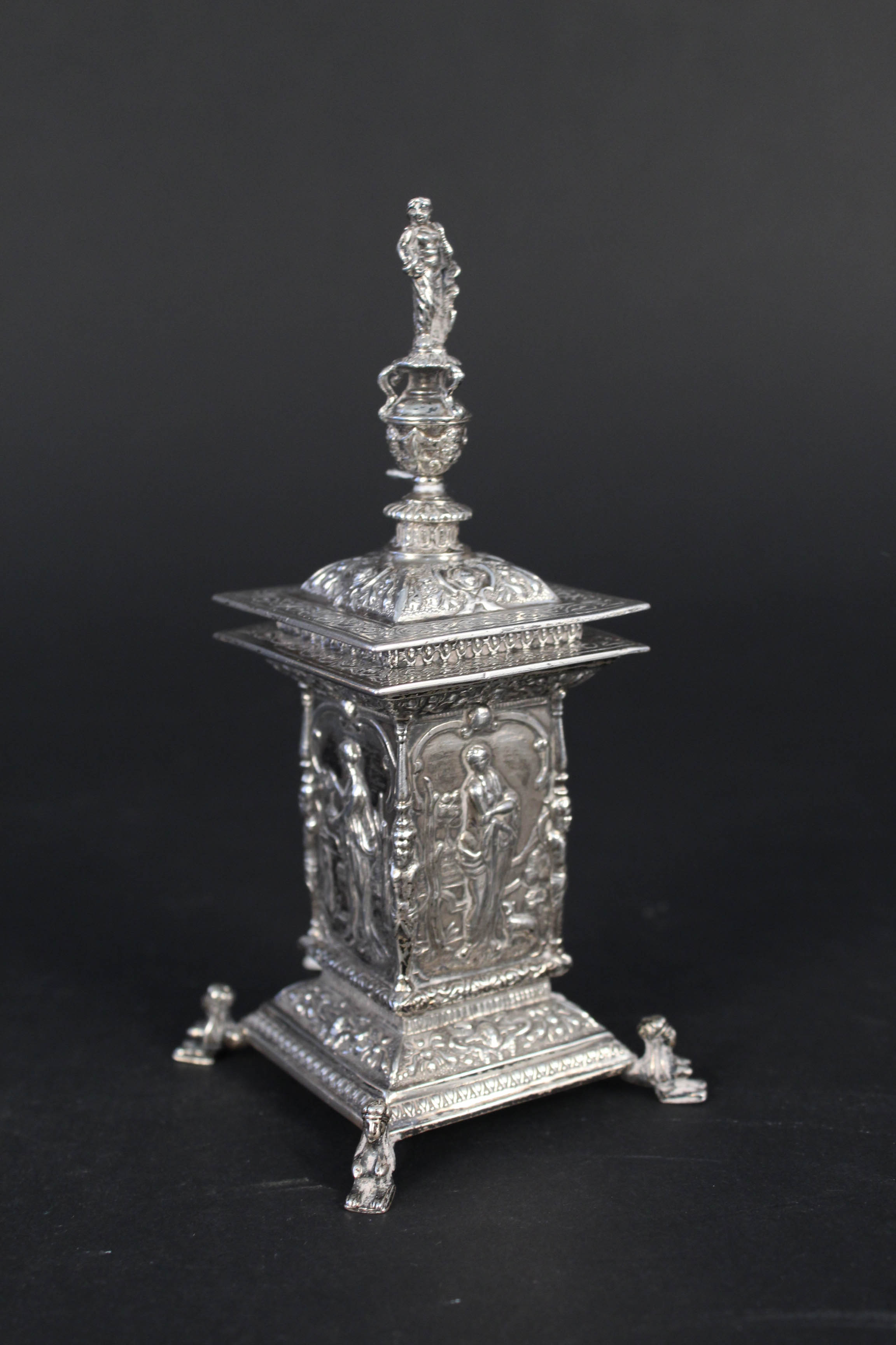 An unusual highly decorated silver inkwell, the main four sided body has a different Roman Goddess,