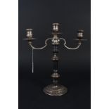 A silver three light candelabra,