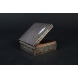 A small silver cigarette box of plain design,