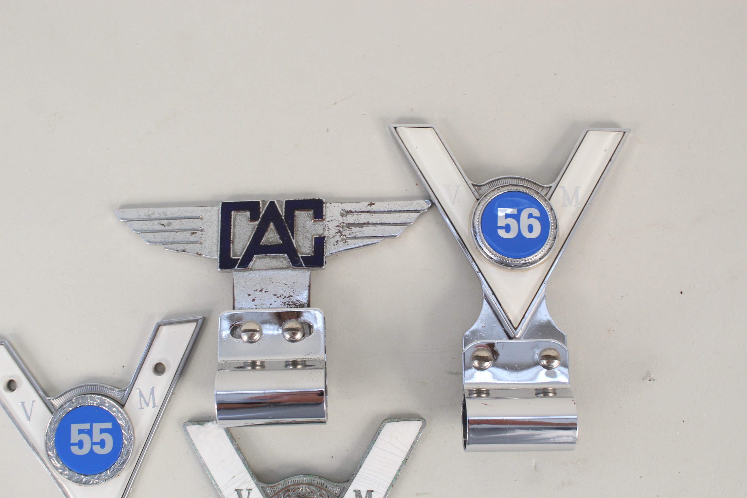 Three 'VM' badges (18, - Image 2 of 3