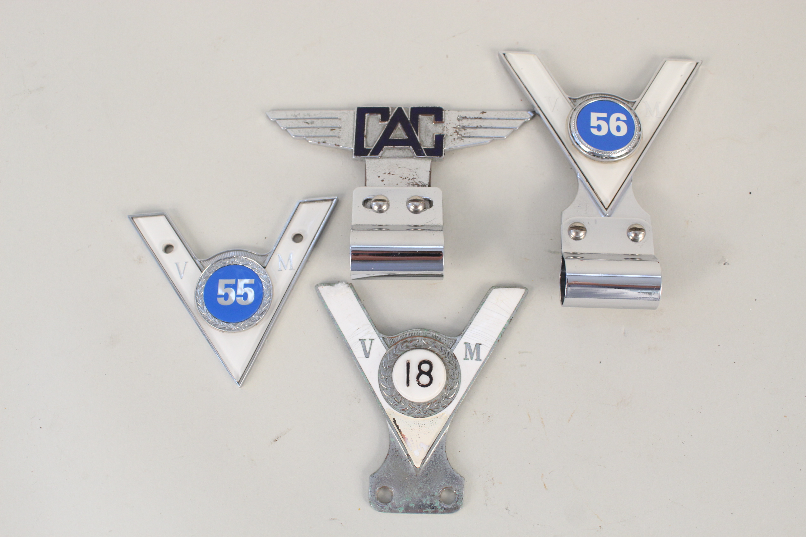 Three 'VM' badges (18,