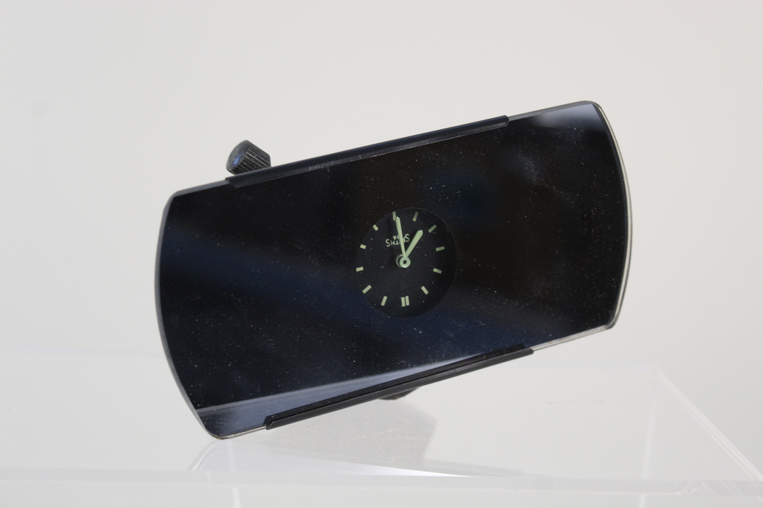 A Smiths rear view mirror with integrated clock