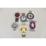 Six assorted badges including 'British Racing' and 'Sports Car Club'
