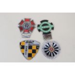 Four assorted badges including 'The Order of the Road' and 'British Field Sports Society'