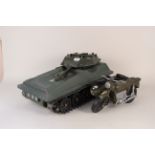 An Action Man toy tank and motorcycle