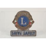 A Lions International 'Drive Safely' badge