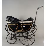 A 1900's dolls pram (restored) plus a childs cane chair