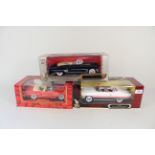 Three boxed 1/18th American car models, Cadillac,