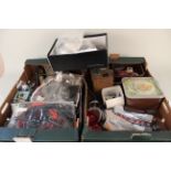 Two boxes containing a quantity of assorted automotive electrical components including bulbs, lamps,
